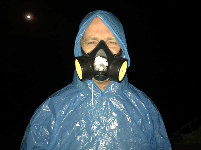 Climbing the Amazing Ijen Volcano in Java to watch the sunrise 7 Alan in his protective gear on Ijen volcano, Java| The Silver Nomad