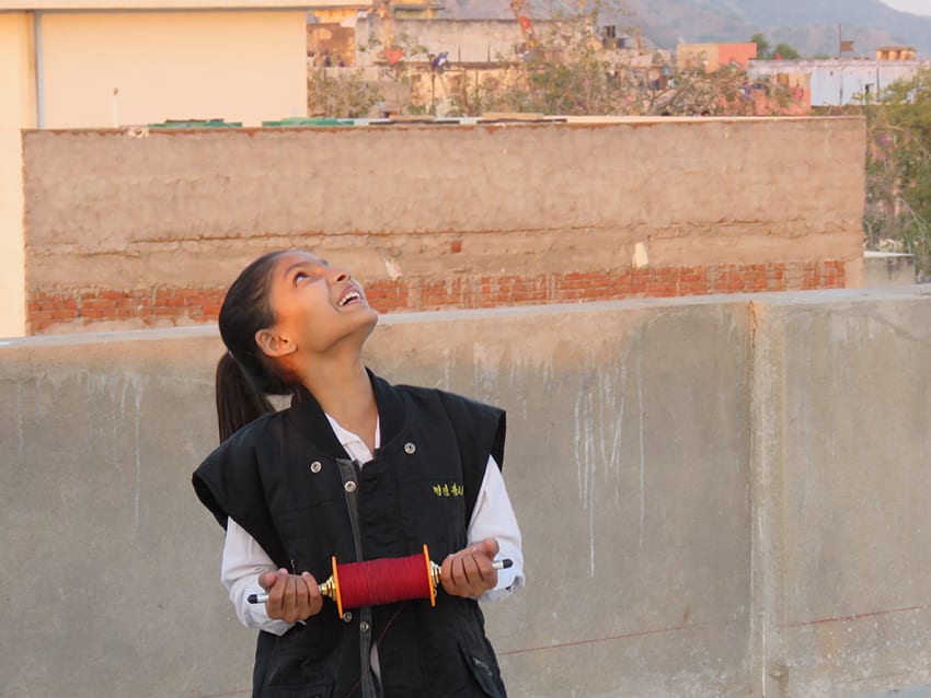 Making Friends At The Stunning Kite Festival In Jaipur 4 The girls flying kites at the Kite Festival