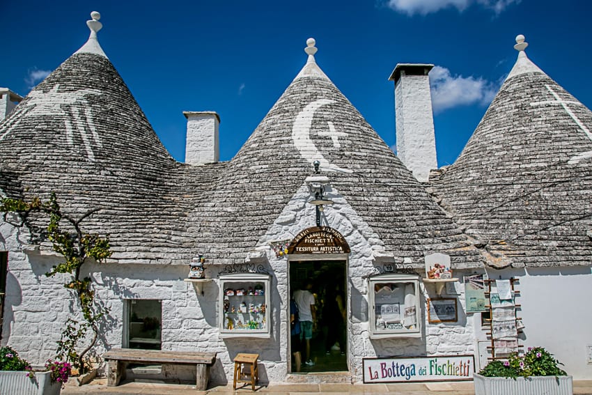 23 Amazing UNESCO Sites in Europe, Off the Beaten Track 11 Truillis - typical houses in Puglia Italy with round walls painted white and grey slate pointed roofs