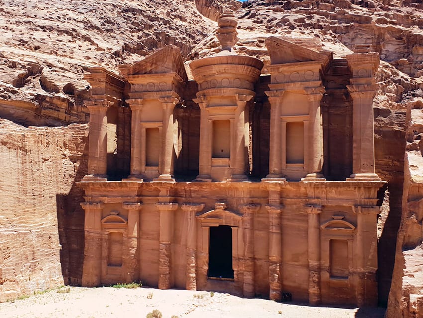 8 Amazing UNESCO Sites in The Middle East - Off the Beaten Track 8 Petra Monastery carved out of rose coloured rock
