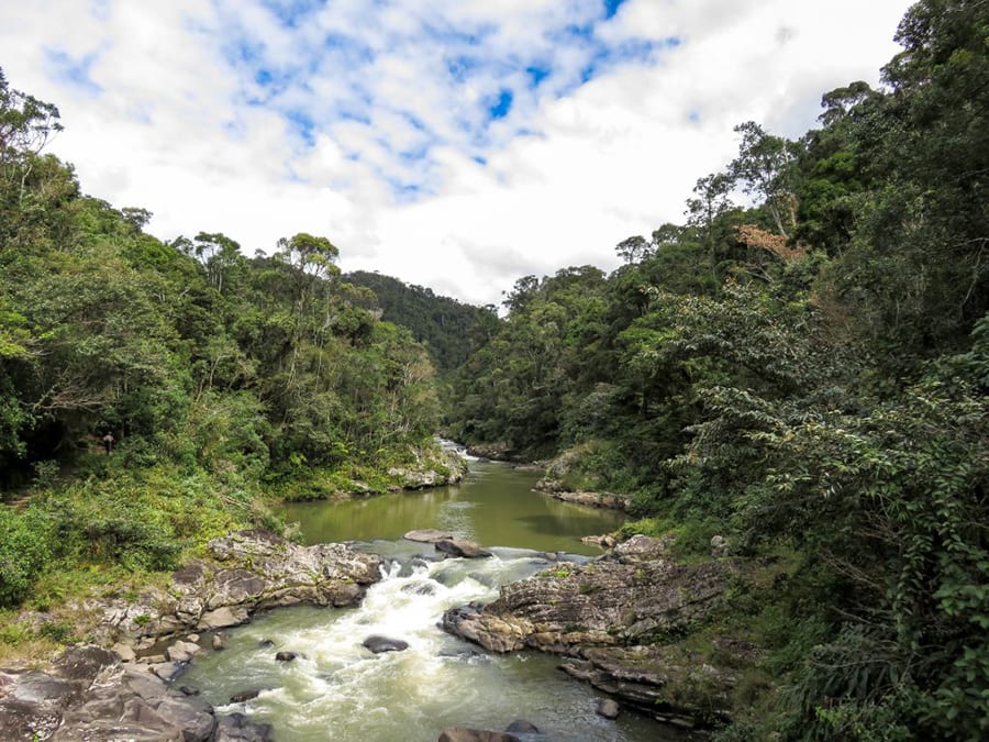 12 Amazing Unesco Heritage Sites In Africa - Off The Beaten Track 8 river with a small waterfall, surrounded by lush jungle