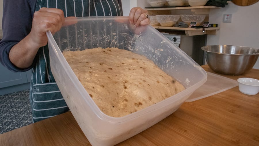 Artisan Bread Baking at the Abergavenny Baker 8 plastic container with creamy coloured dough