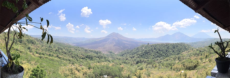 10 Great Reasons To Visit Indonesia 7 view over green land to mountains in the background