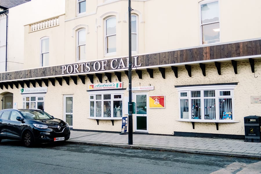 20+ Of The Best Things To Do In Port St Mary, Isle Of Man (2023) 18 Cream building with bow window the front of Andrea's Pizzeria
