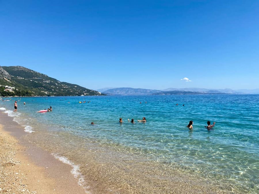 35+ Amazing Hidden Gems In Europe You Must Visit 38 turquoise sea with golden sand and batheres in the water