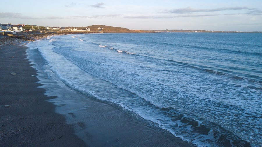 20+ Of The Best Things To Do In Port St Mary, Isle Of Man (2023) 5 Gansey Bay in the Isle of Man with sand and waves coming in