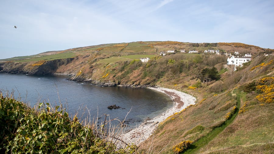 20+ Of The Best Things To Do In Port St Mary, Isle Of Man (2023) 12 white pebble beach with green hill behind