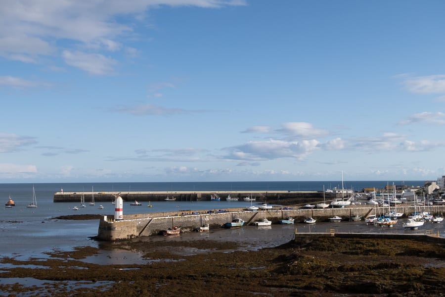 20+ Of The Best Things To Do In Port St Mary, Isle Of Man (2023) 10 two piers with boats and yachts and seaweed in the forgrround