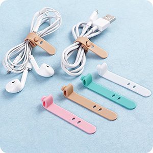 pink, beige, green and white cable ties