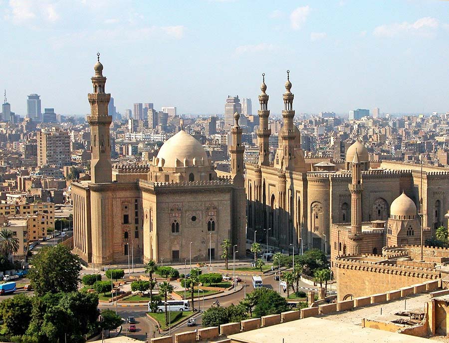 12 Amazing Unesco Heritage Sites In Africa - Off The Beaten Track 9 The old mosque in Cairo with the modern city behind