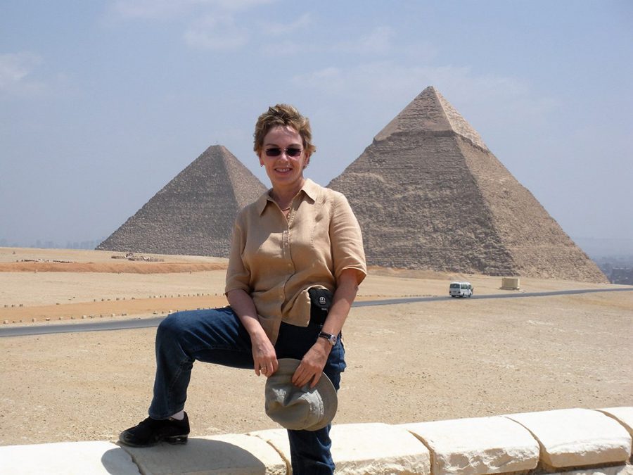 Celebrating 16 Awesome Mature Bloggers In 2021 To Inspire You 4 Talek from Travels with Talek with two pyramids behind her