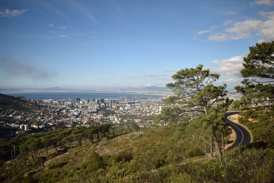 25 Amazing Destinations For Winter Sun Around The World 3 Cape Town City from the hills above with a winding road in the foreground