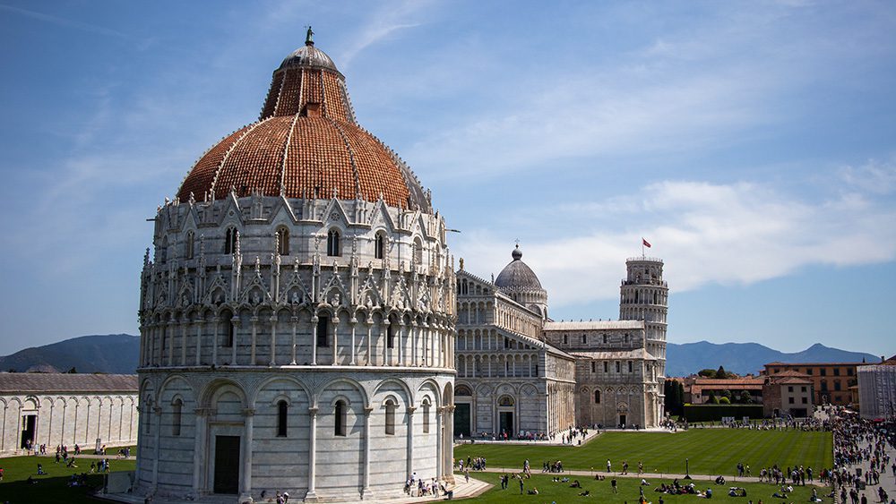Stunning UNESCO Sites in Italy to discover in 2023 5 The Piazza del Douomo in Pisa with the Cathedral, the Bapistry, The Leaning Tower of Pisa and the cementry