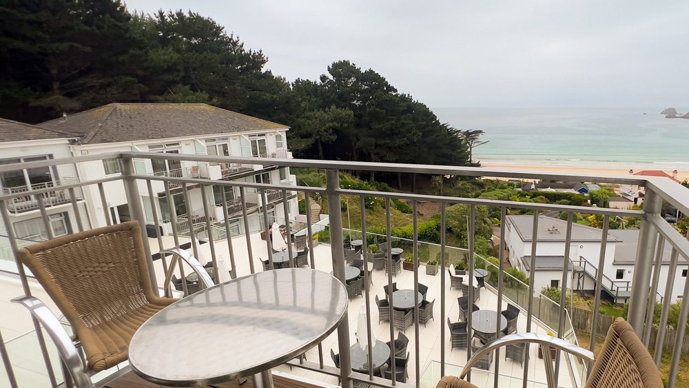 Visiting The Beautiful Biarritz Hotel In Jersey, Channel Islands (2023) 7 Balcony at the Biarritz hotel overlooking the terrace and St Brelade's Bay