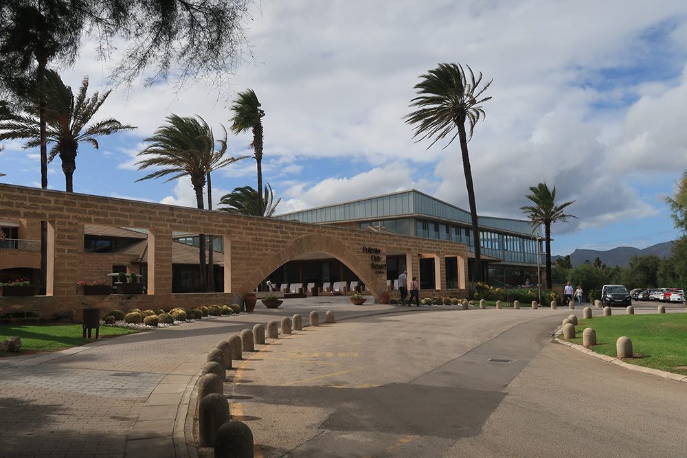 Portblue Club Pollentia Hotel entrance with swaying palm trees