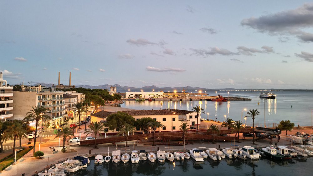 Port Alcudia at dusk with yachts in the foreground