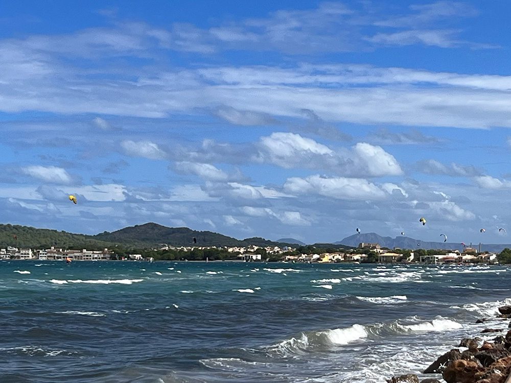 27 Of The Best Things To Do In Alcudia, Mallorca (2023) 7 Kite surfers at Alcudia