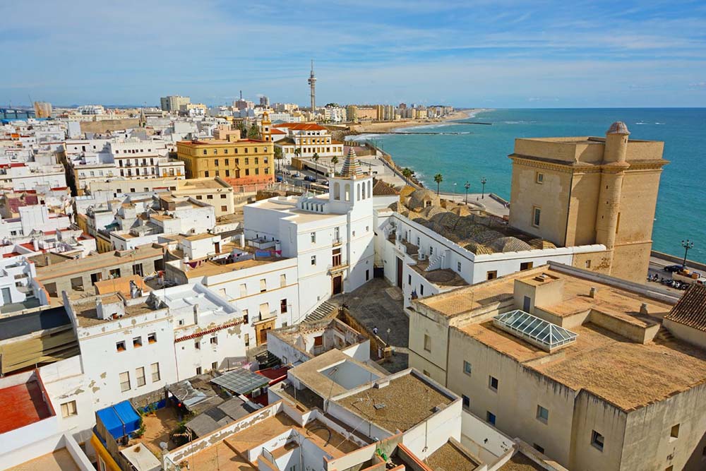 Is Andalucia Worth Visiting? 7 Amazing Reasons to Visit in 2025 6 Iglesia de Santa Cruz, Cadiz overlooking the bay