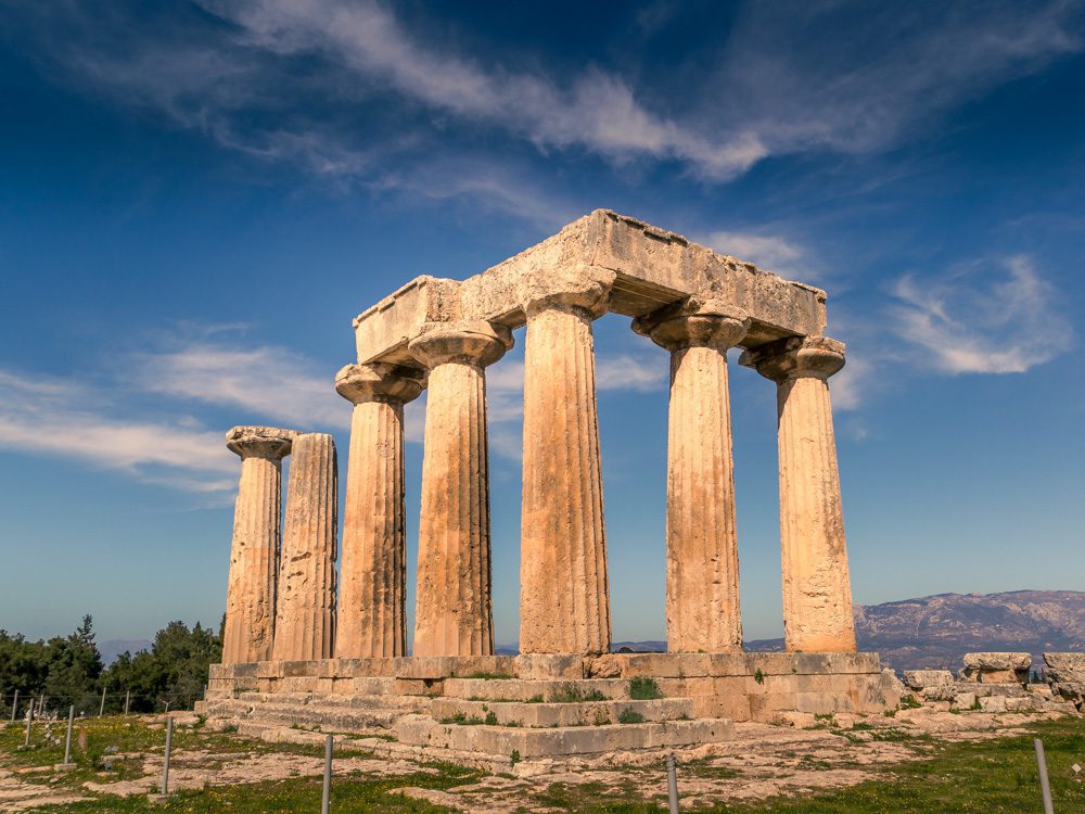 Ancient Corinth in Peloponnese Greece showing the ancient ruined columns