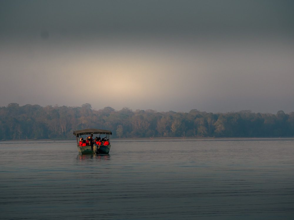 One of the boats skimming across the river