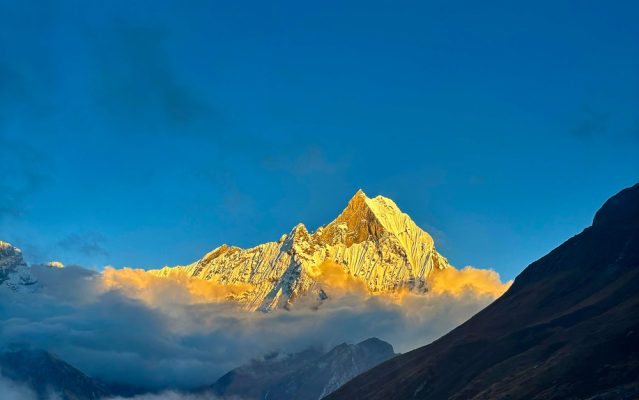 Majestic mountain peak at sunrise at Annapurna Base Camp Trek